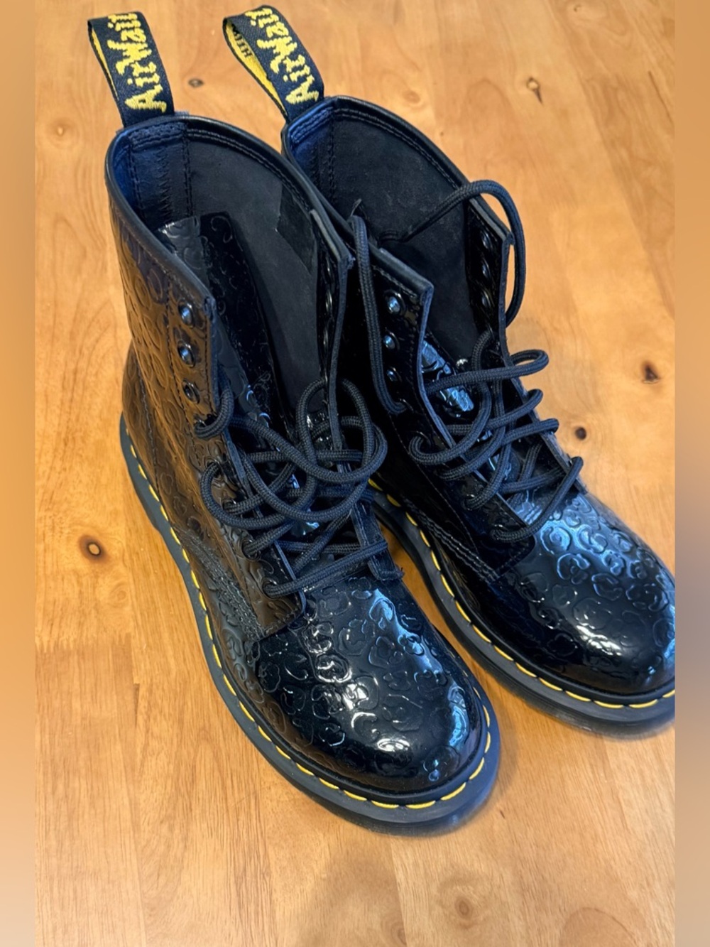 Dr. Martens Black Patent Leopard Embossed Lace-Up Boots with Gloss Finish